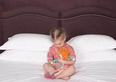 girl on comfy double-bed