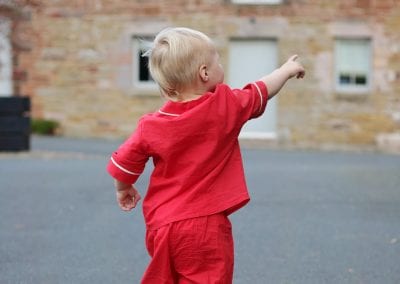 Child enjoying the outside at Beech House Holidays